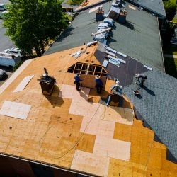 Construction,Worker,On,A,Renovation,Roof,The,House,Installed,New