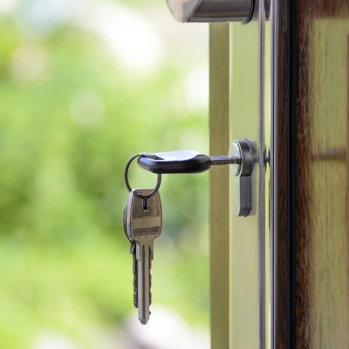 house door with key in lock